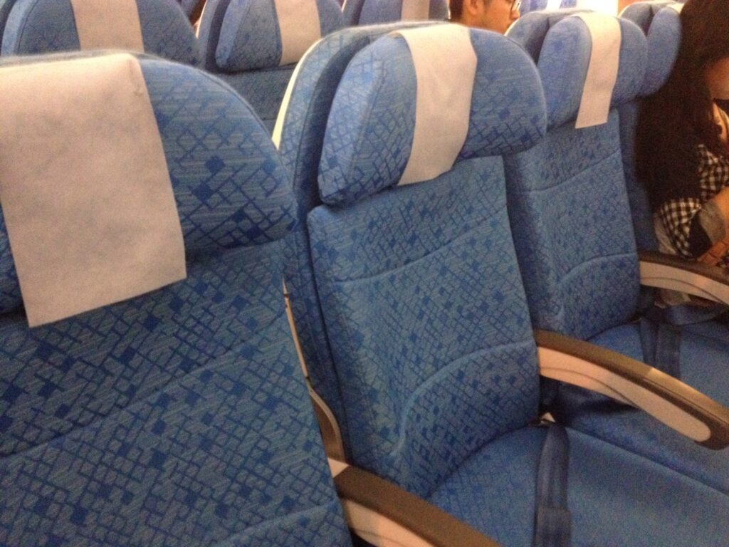 a row of blue seats