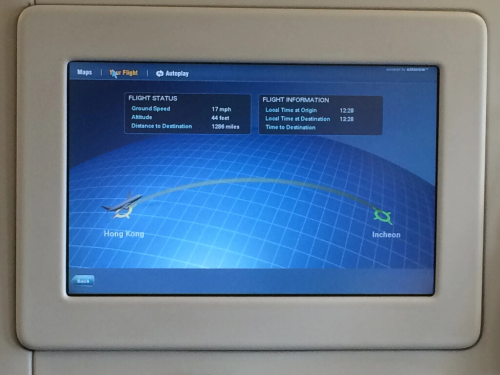a screen with a map and plane on it
