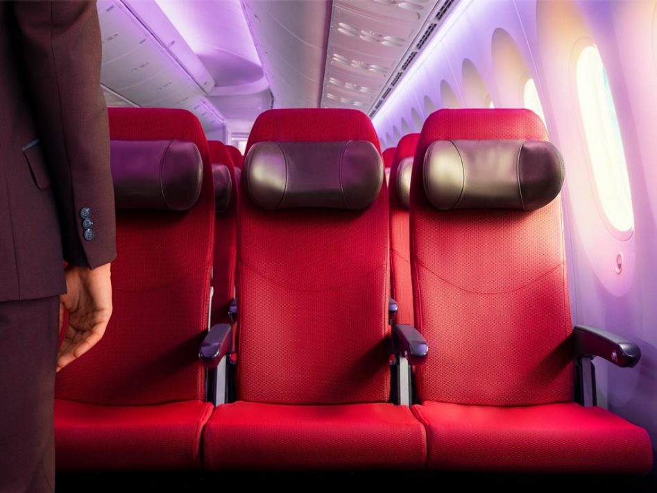 a red seats in an airplane