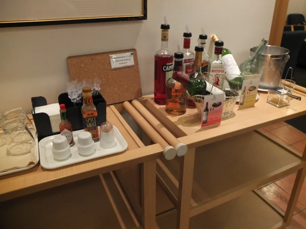 a table with bottles and other objects on it