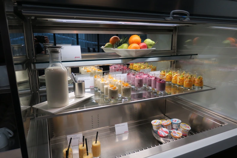 a display of fruit and yogurt