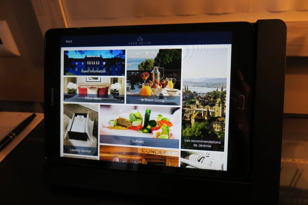 a tablet with a picture of a hotel