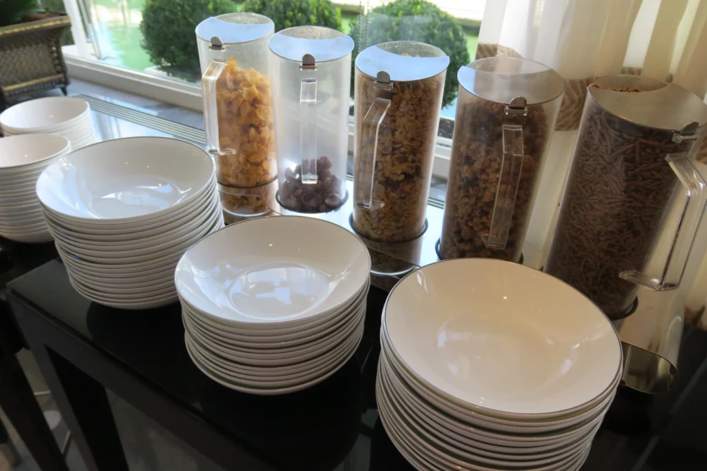 a stack of plates and cereals
