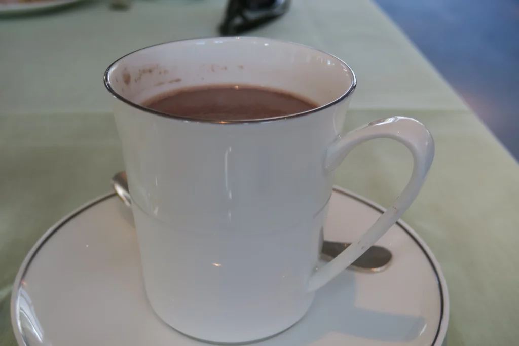 a cup of hot chocolate on a saucer