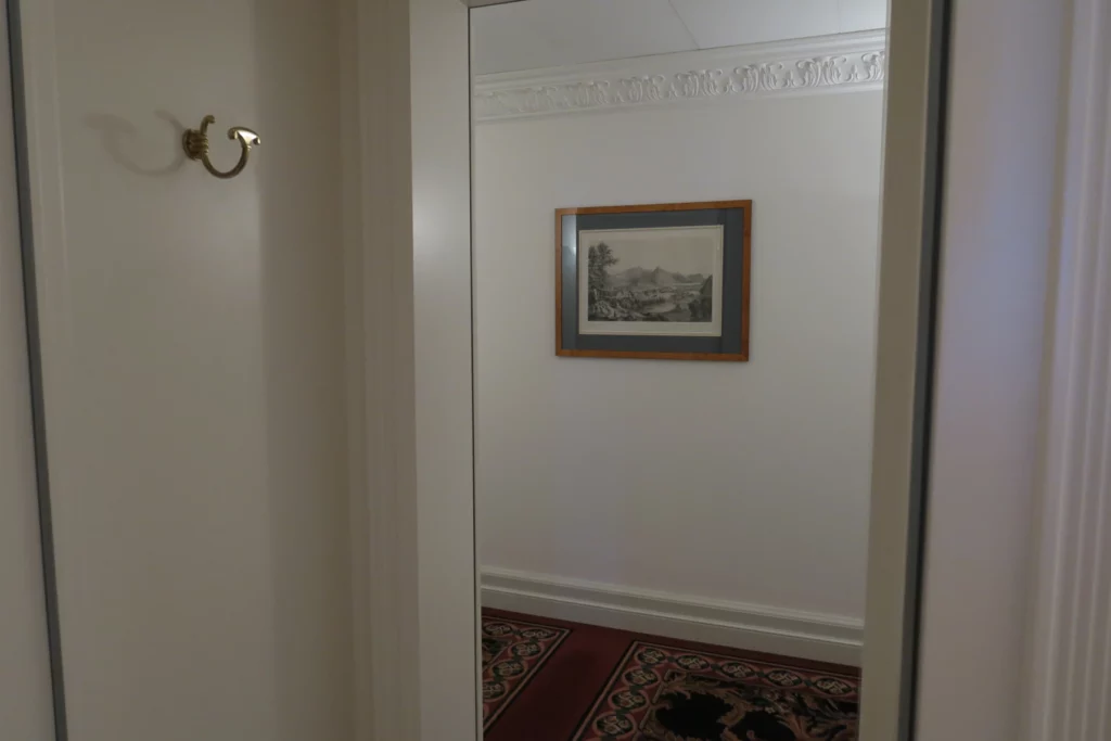 a door with a picture on the wall