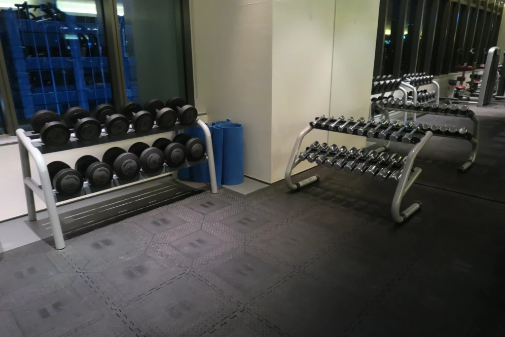 a room with weights on racks