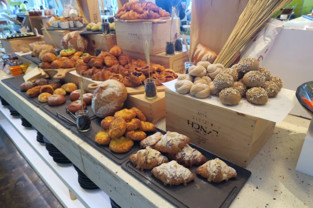 a table full of bread and pastries