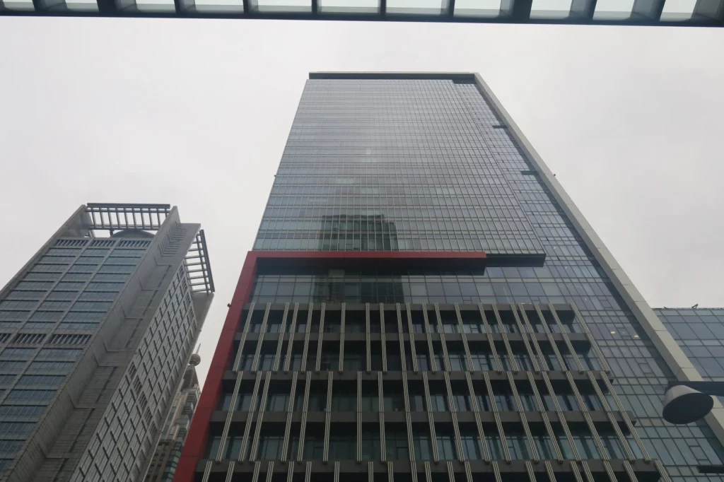 a tall building with a red stripe