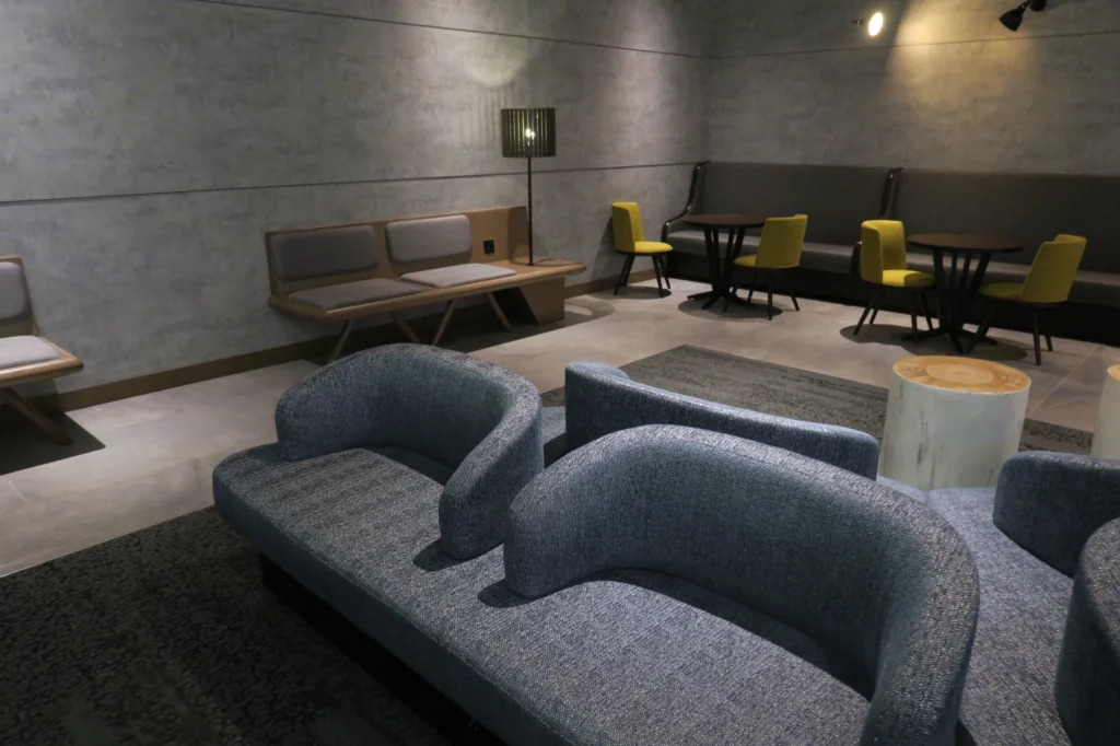 a room with couches and chairs