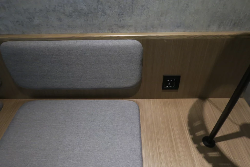 a seat and wall outlet
