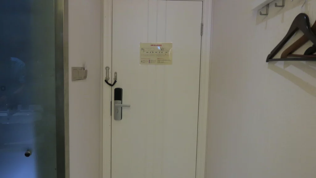 a white door with a sign on it
