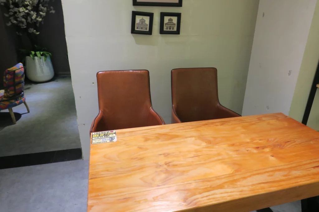 a table and chairs in a room