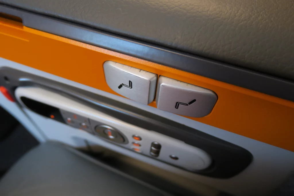 a close up of a seat controls