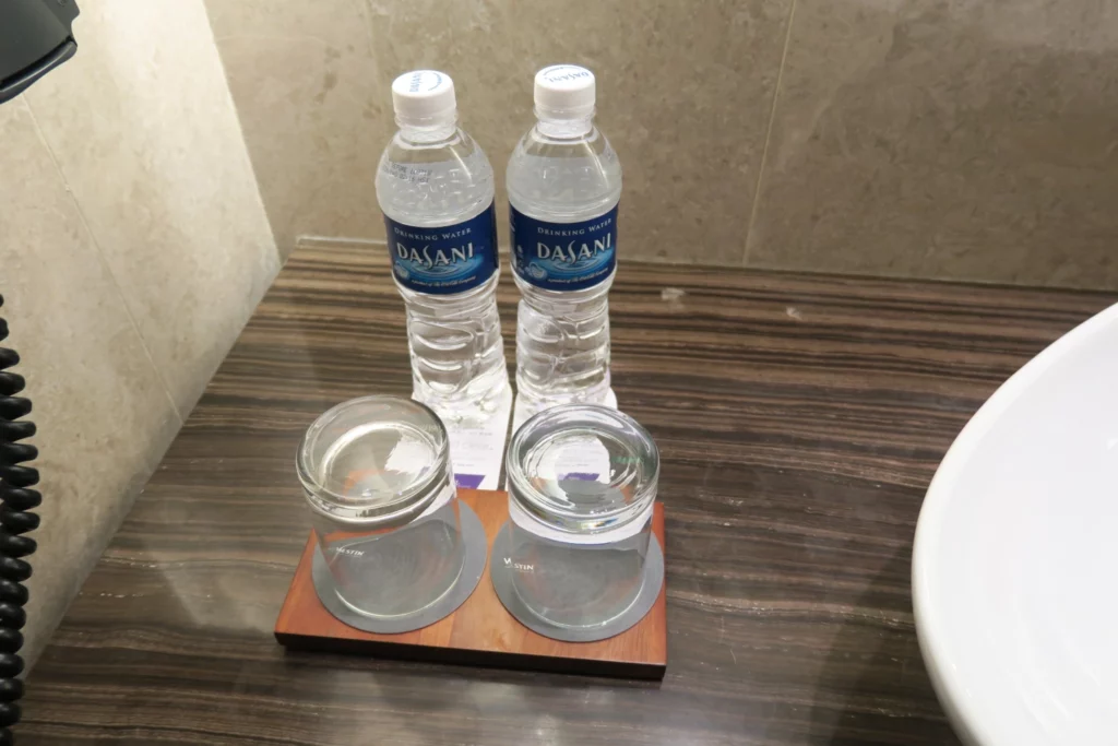 a group of water bottles on a table