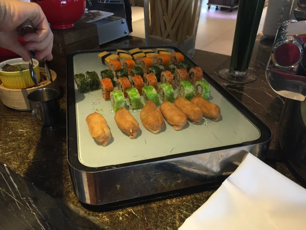 a tray of sushi on a counter