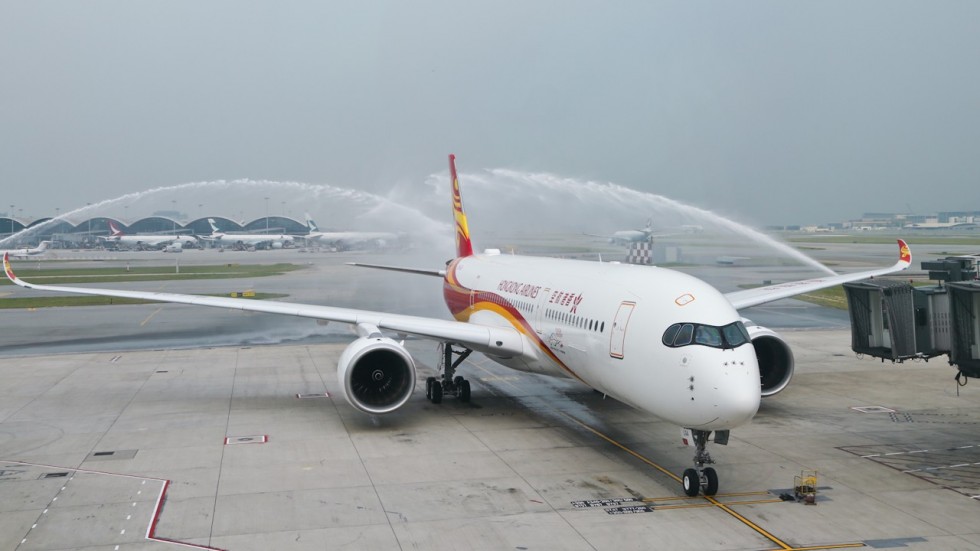 a jet plane spraying water