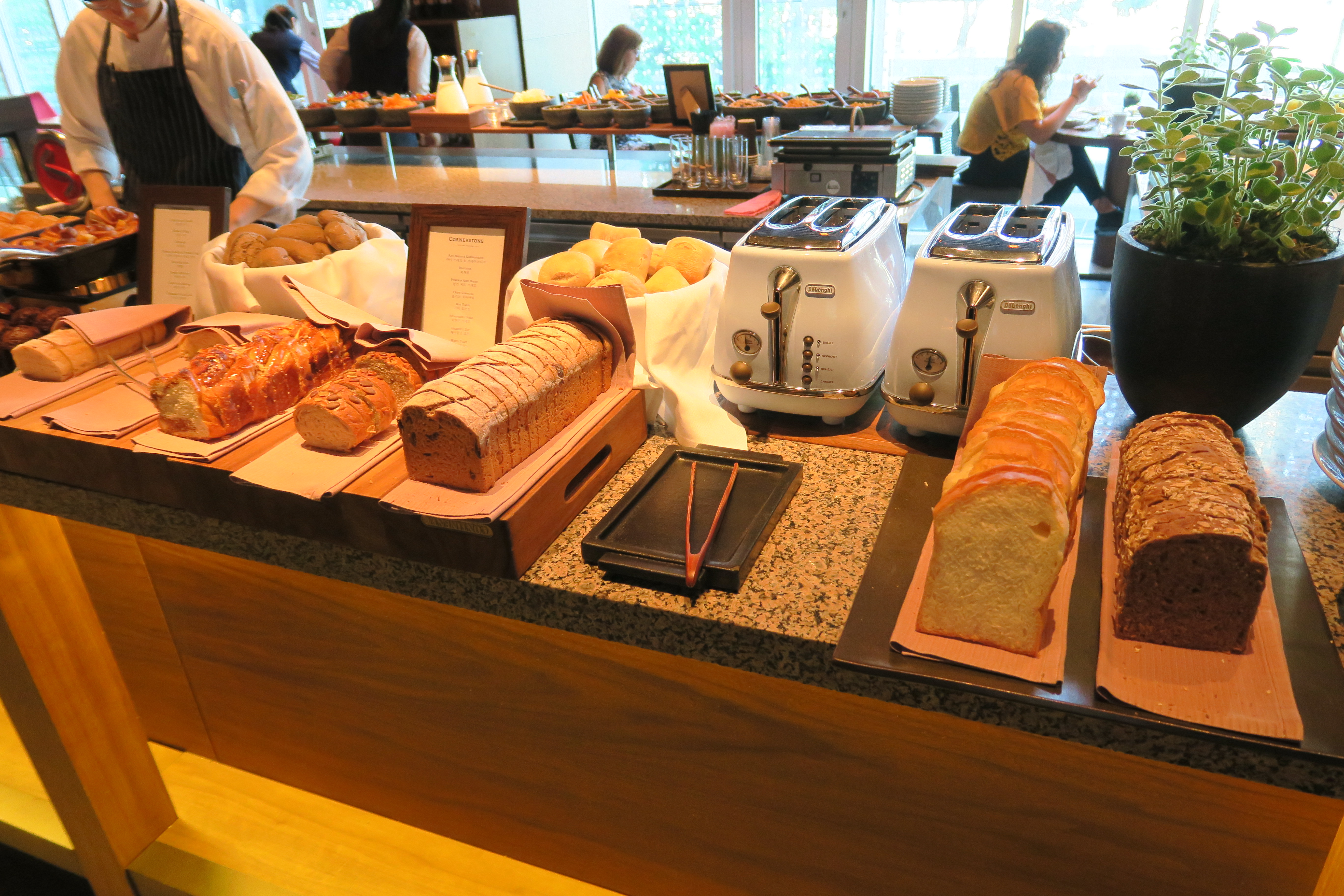 a counter with bread and toasters