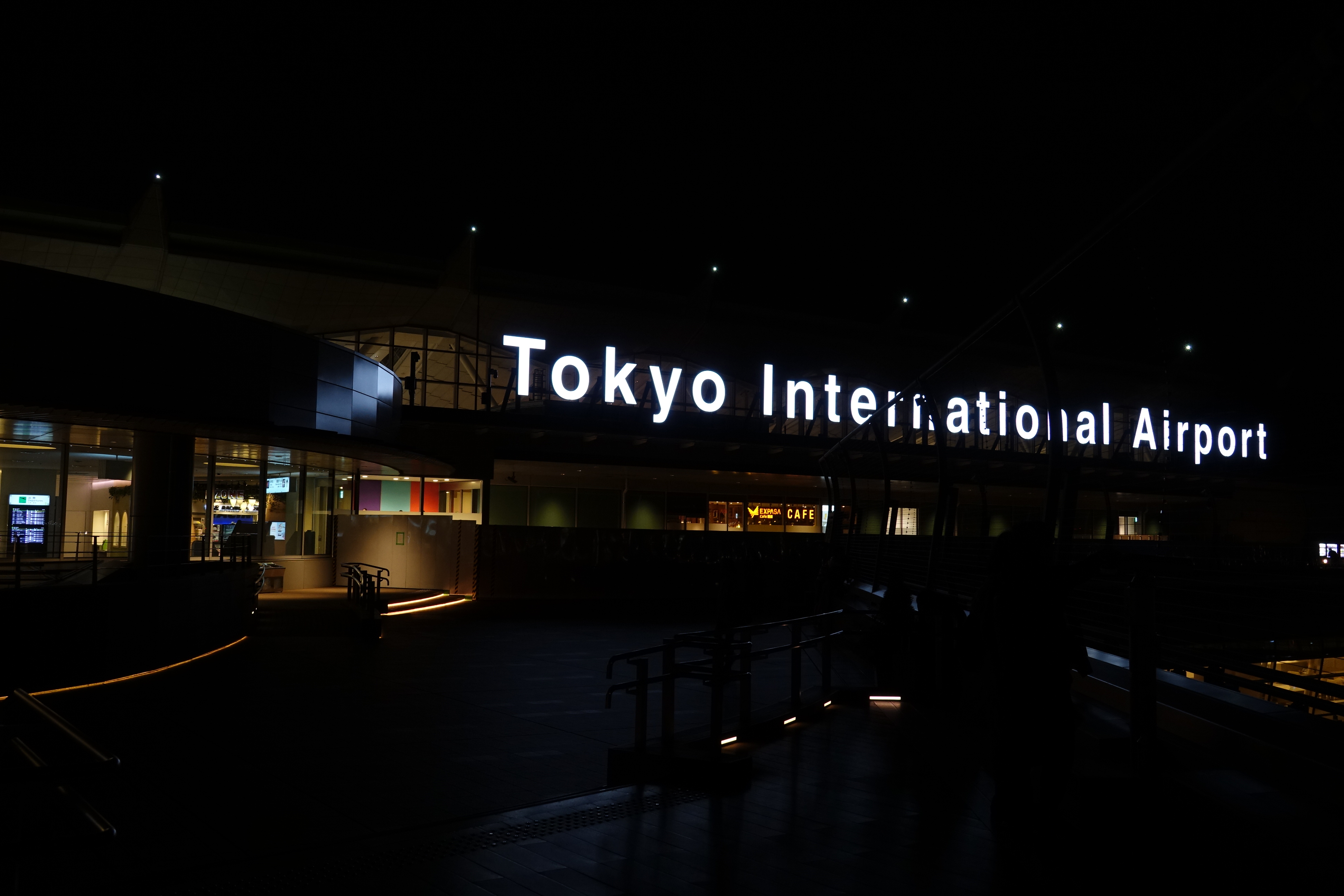 a building with a sign at night