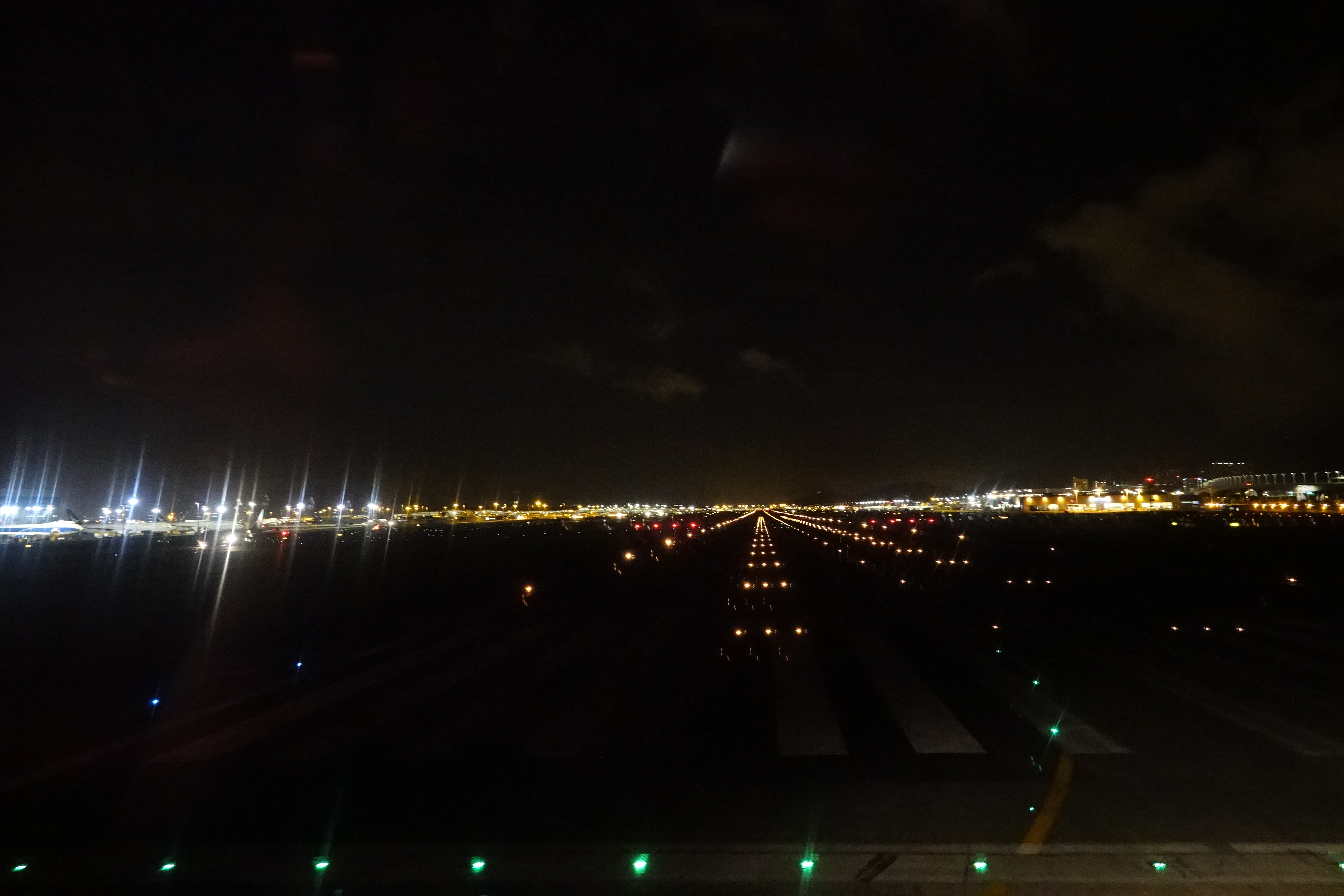 a runway with lights at night