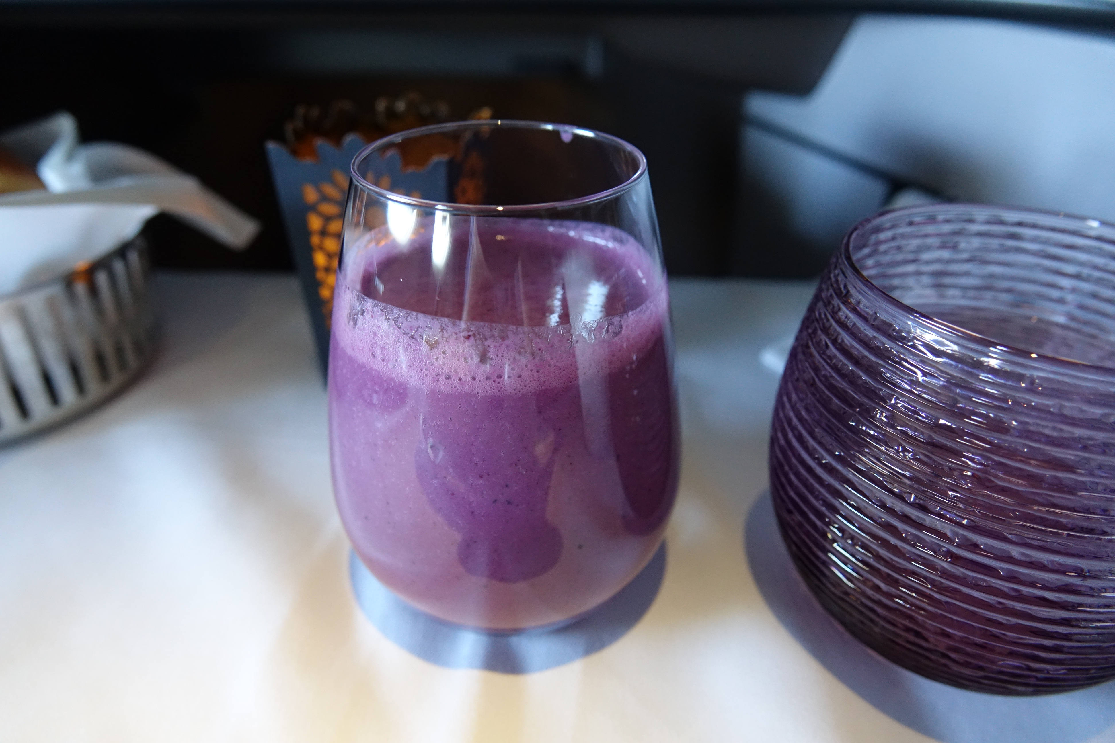 a glass of purple liquid