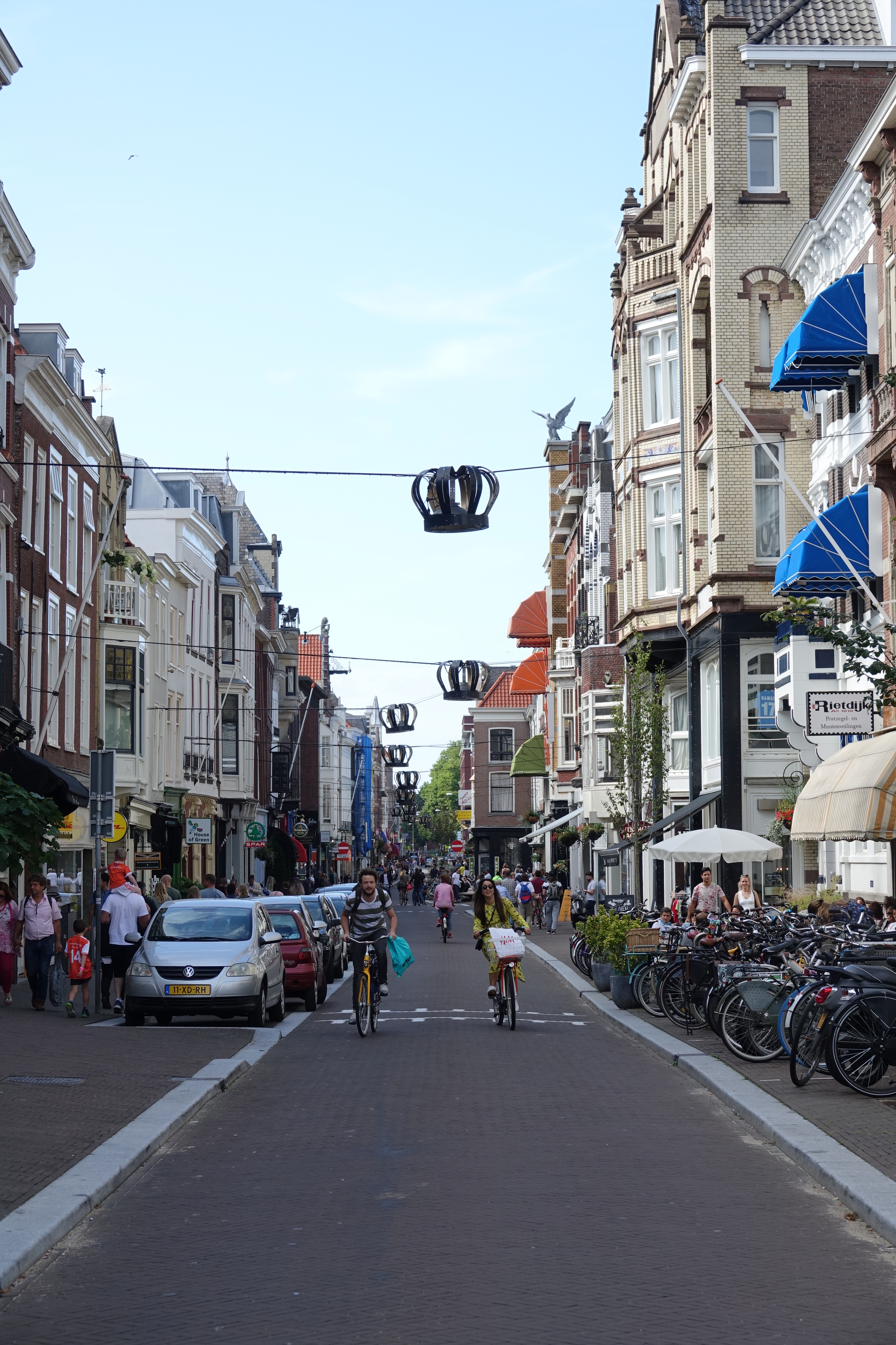 a street with people and bicycles on it
