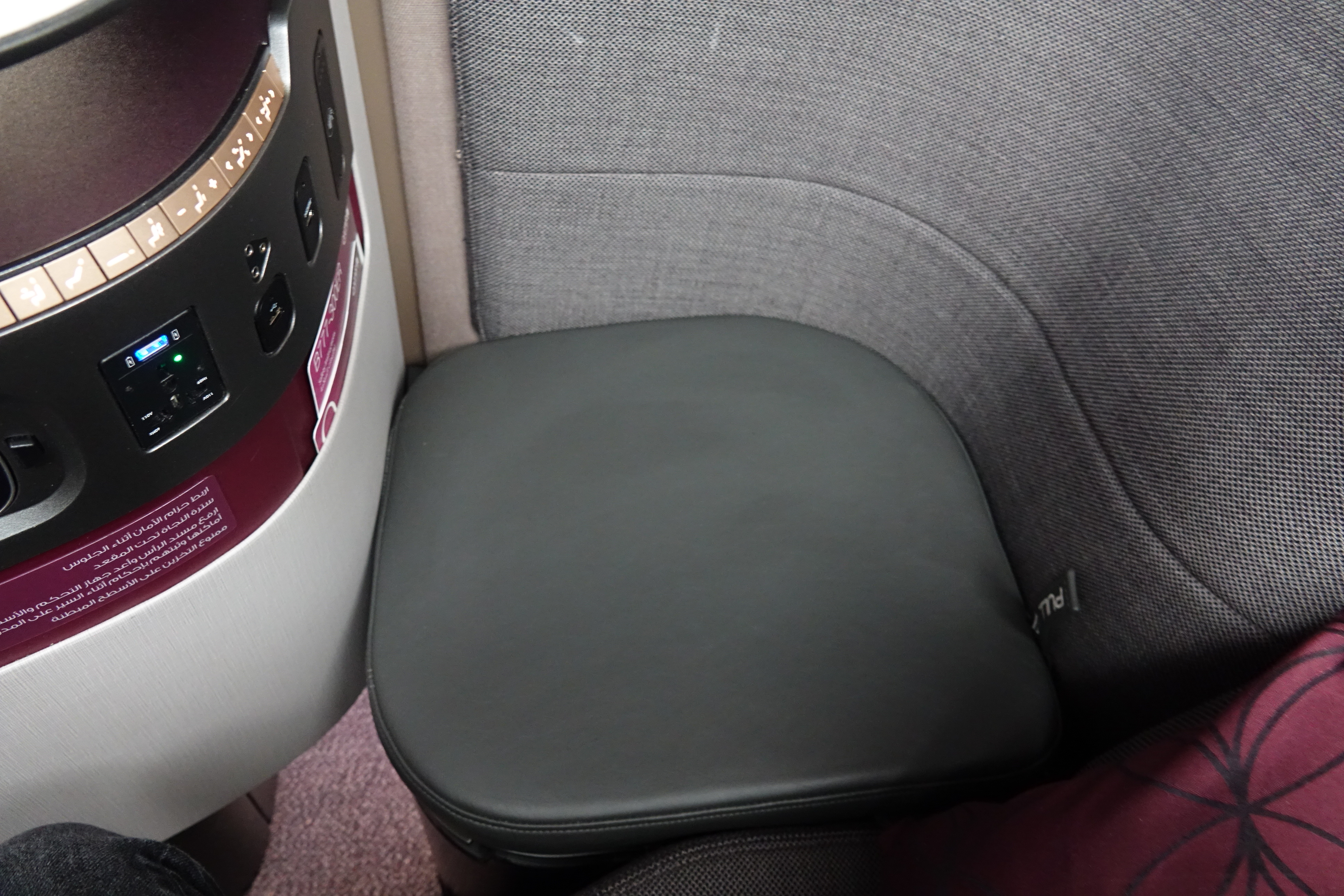 a black arm rest in a chair