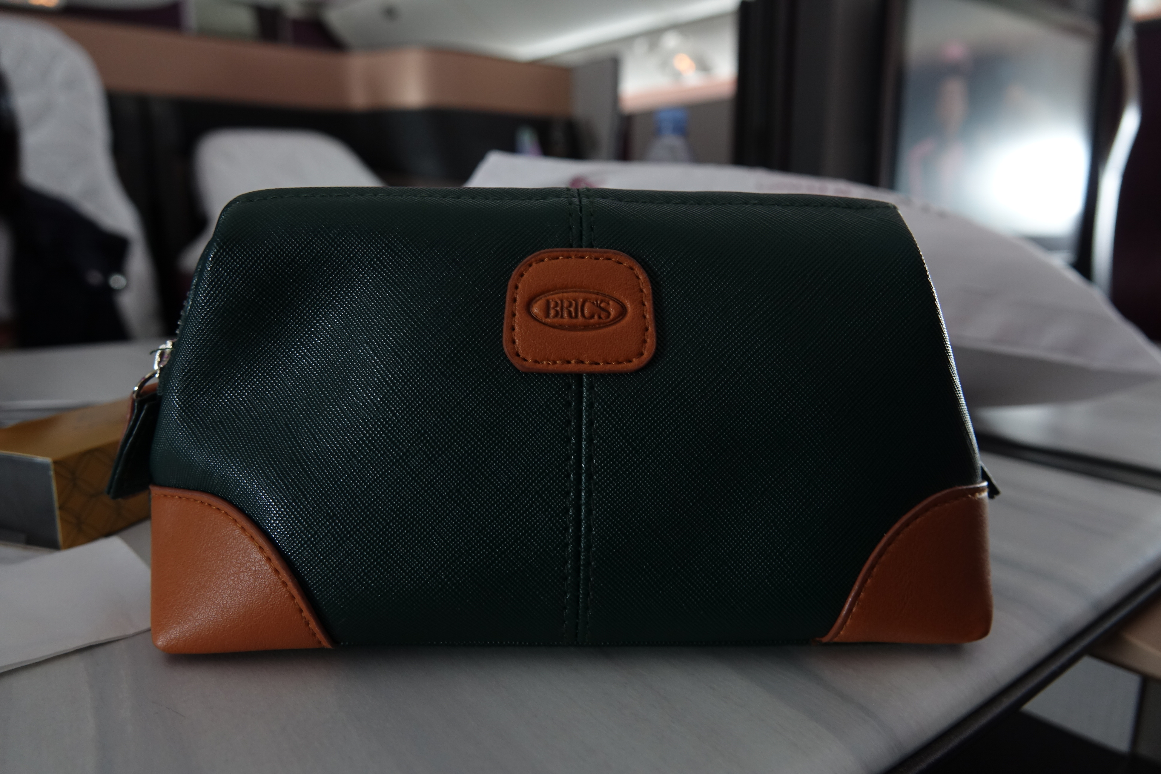 a green and brown purse