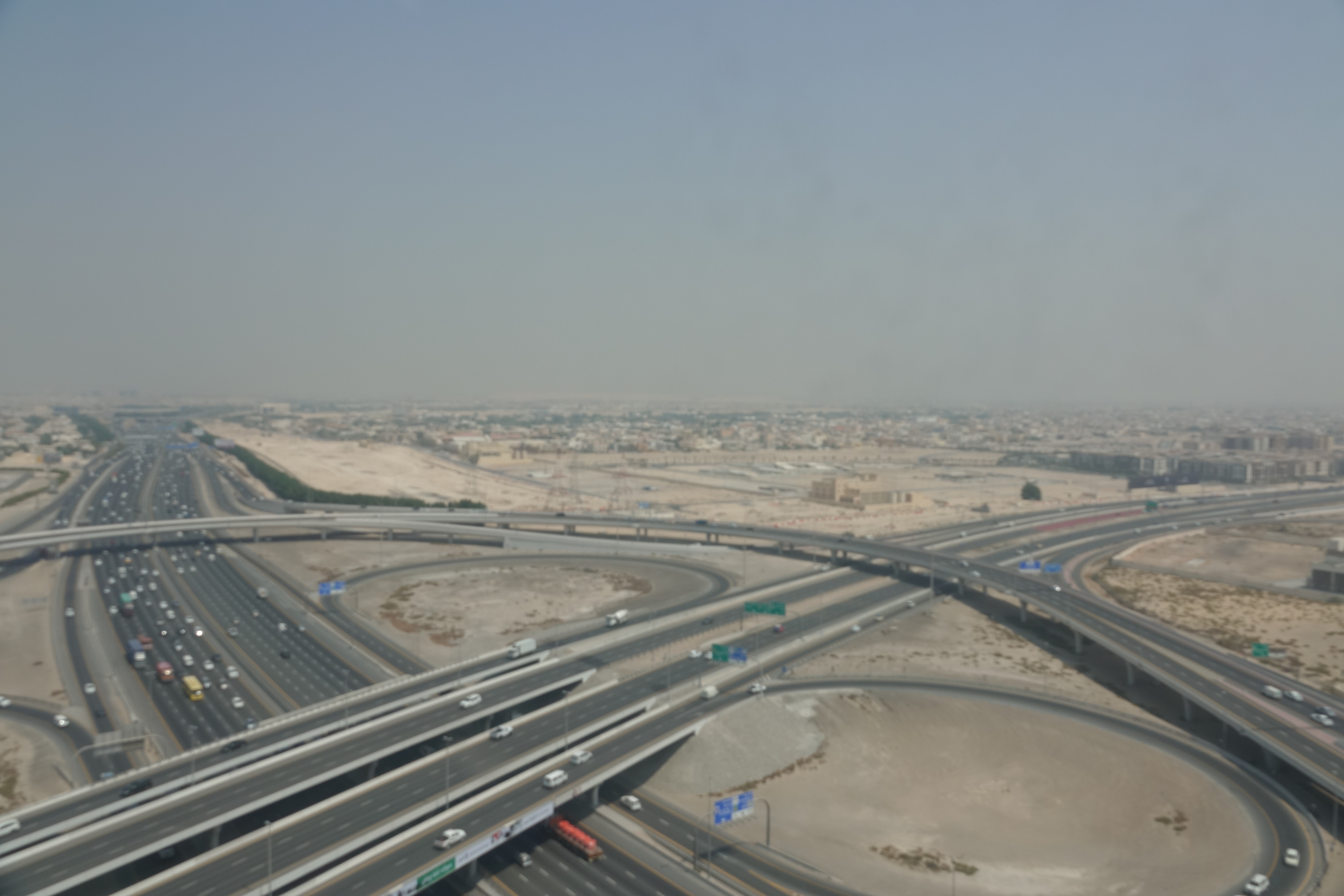 a highway interchange with many roads and cars