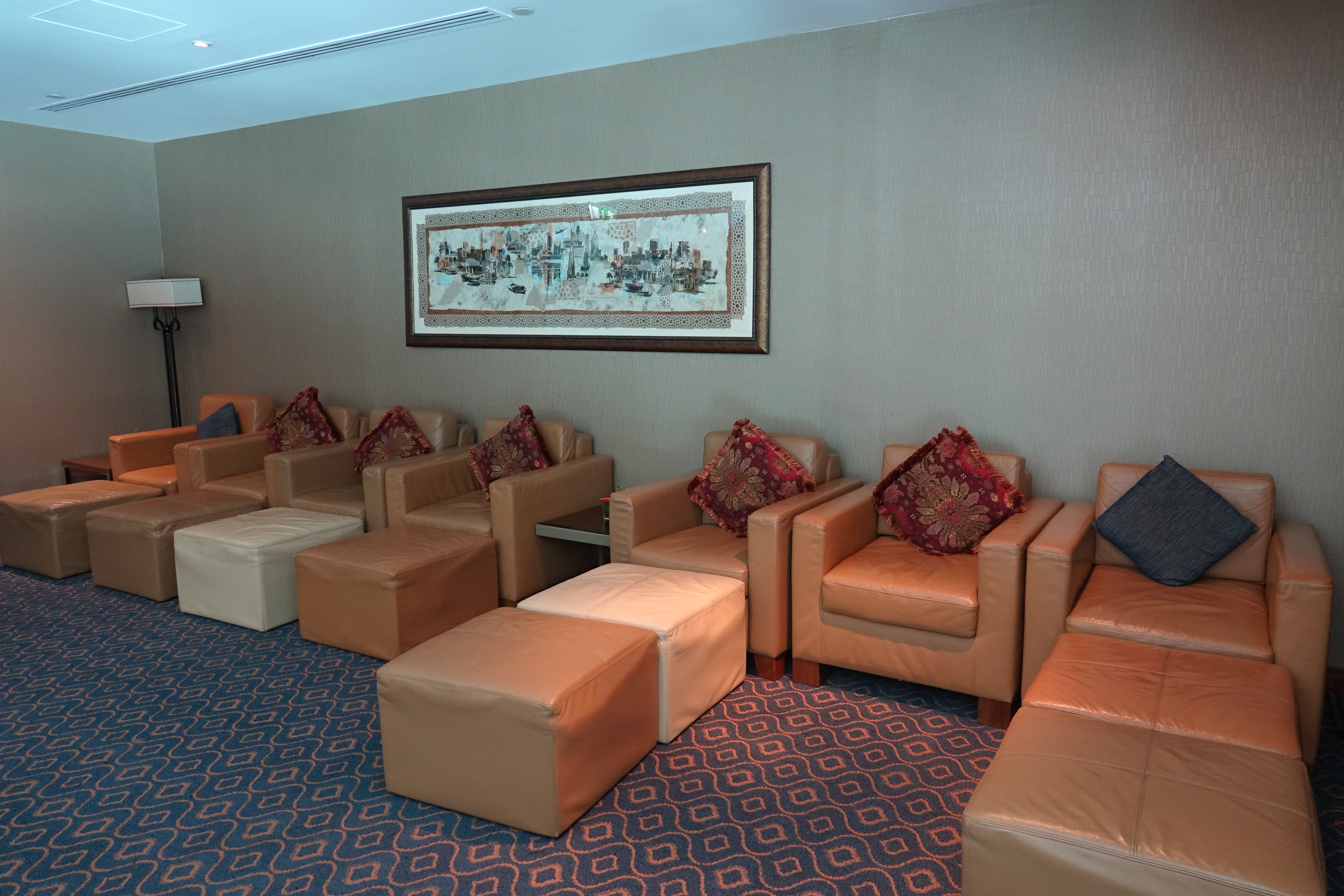a group of leather chairs in a room