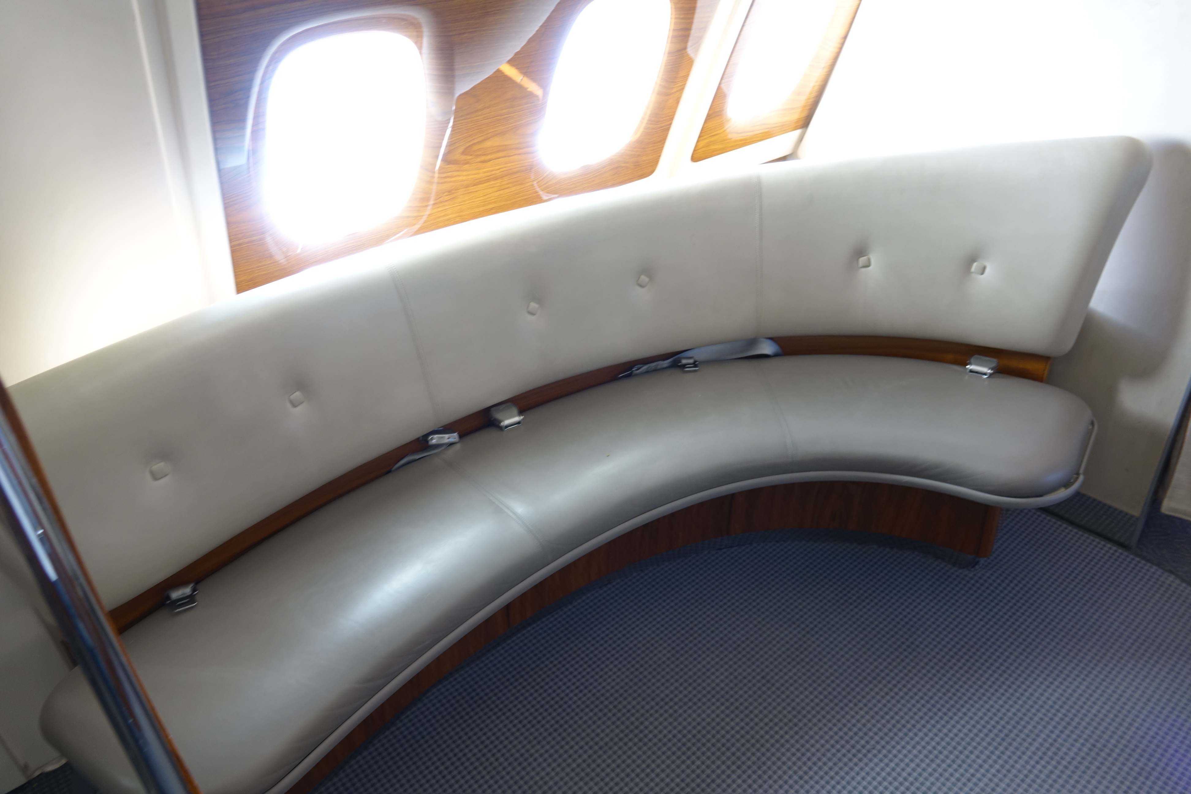 a curved seat in a plane