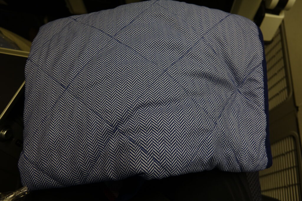 a blue and white pillow