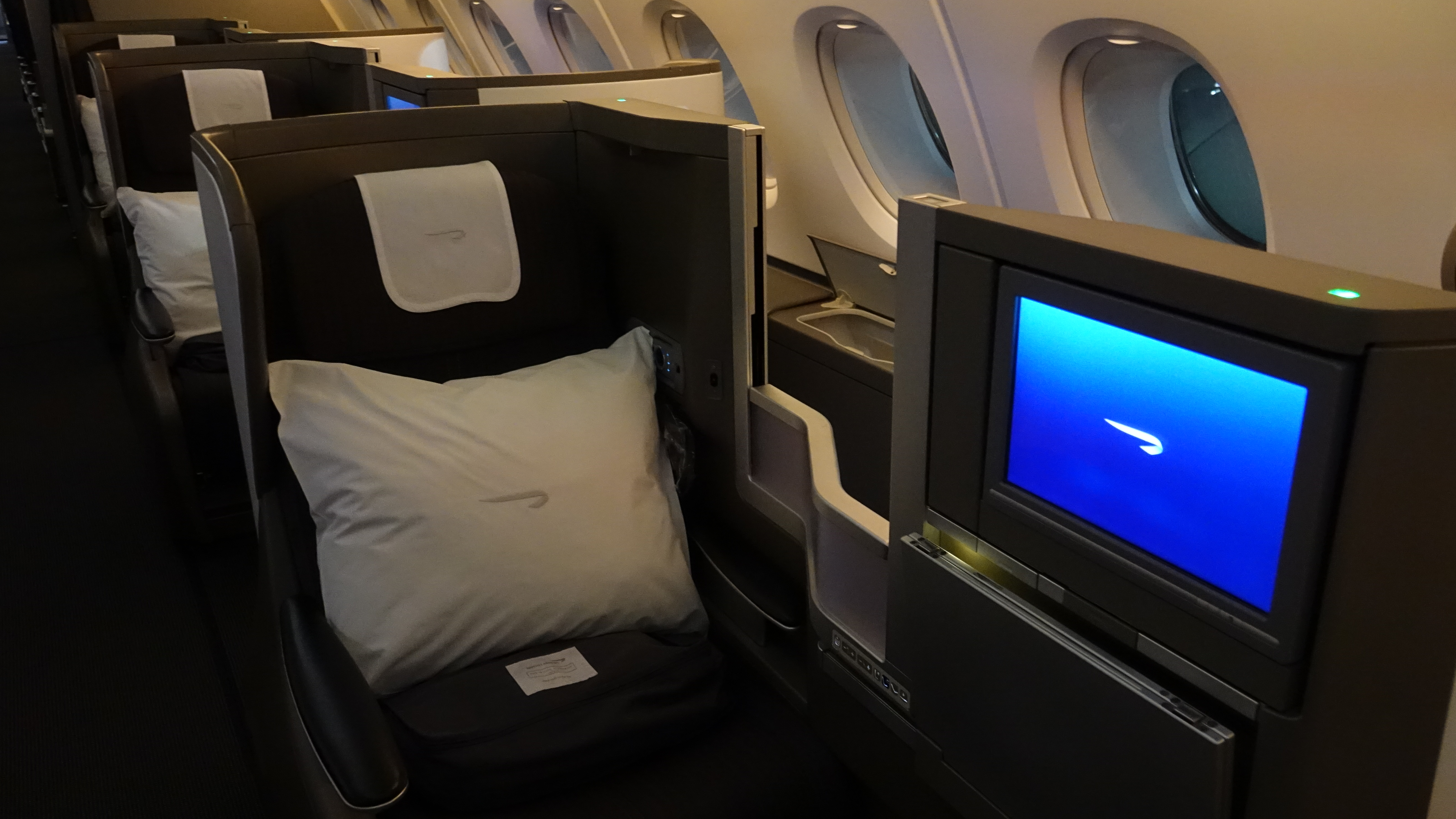 a seat and a pillow in a plane