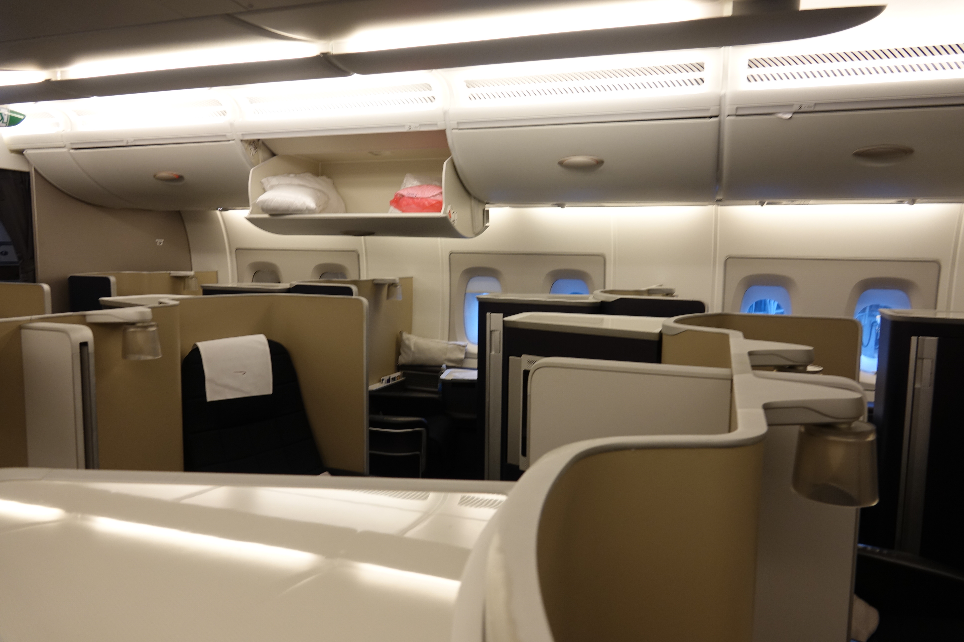 an airplane cabin with seats and windows