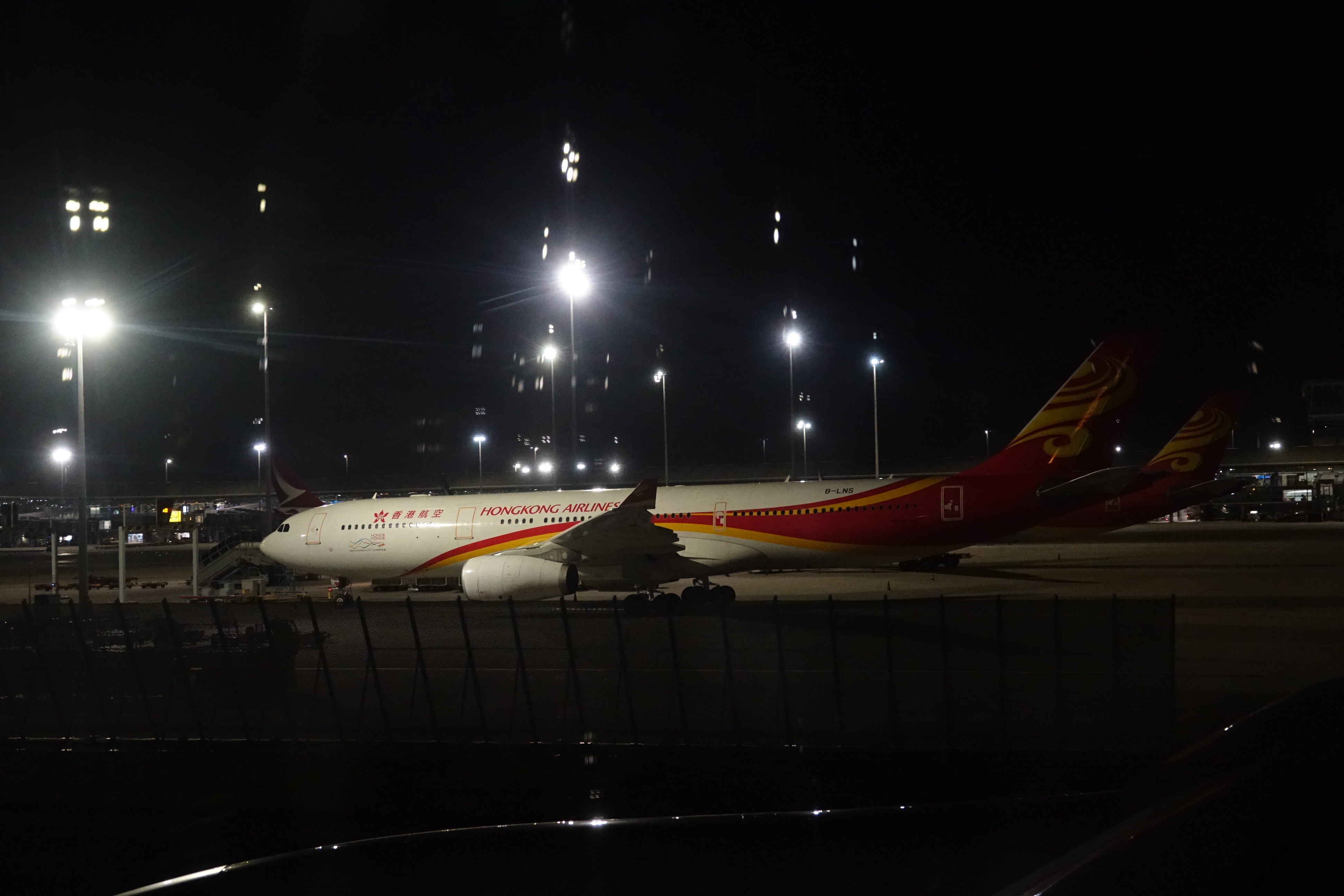 a two airplanes at night