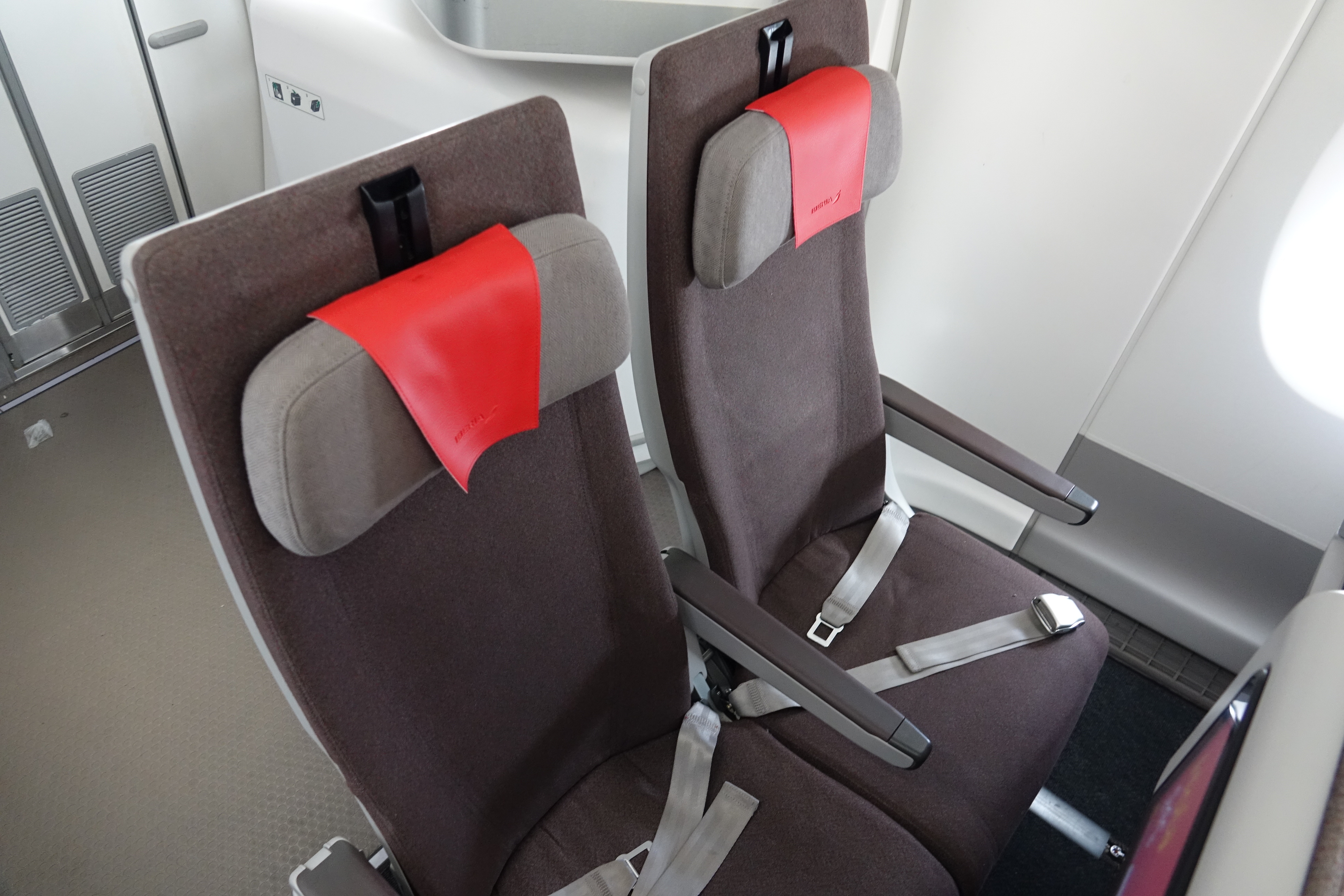 a pair of seats with straps