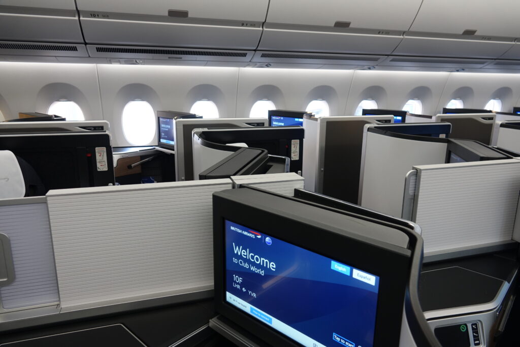 a row of screens in an airplane