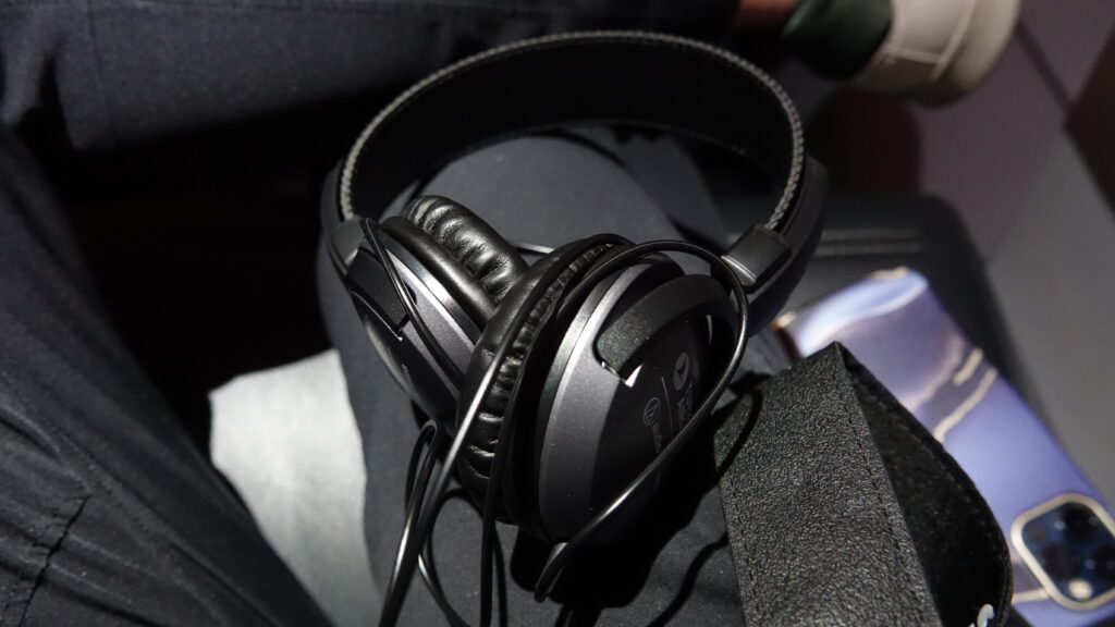 a headphones on a person's lap