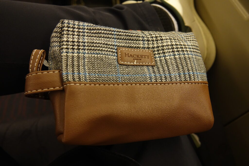 a brown and blue checkered bag