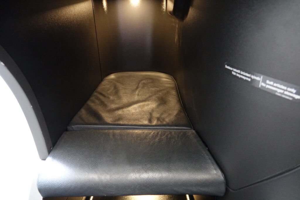 a black seat in a booth