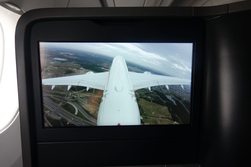 a screen with an airplane wing on it