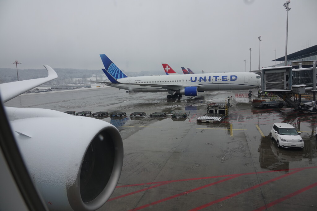 Snow-covered Wing and United 767