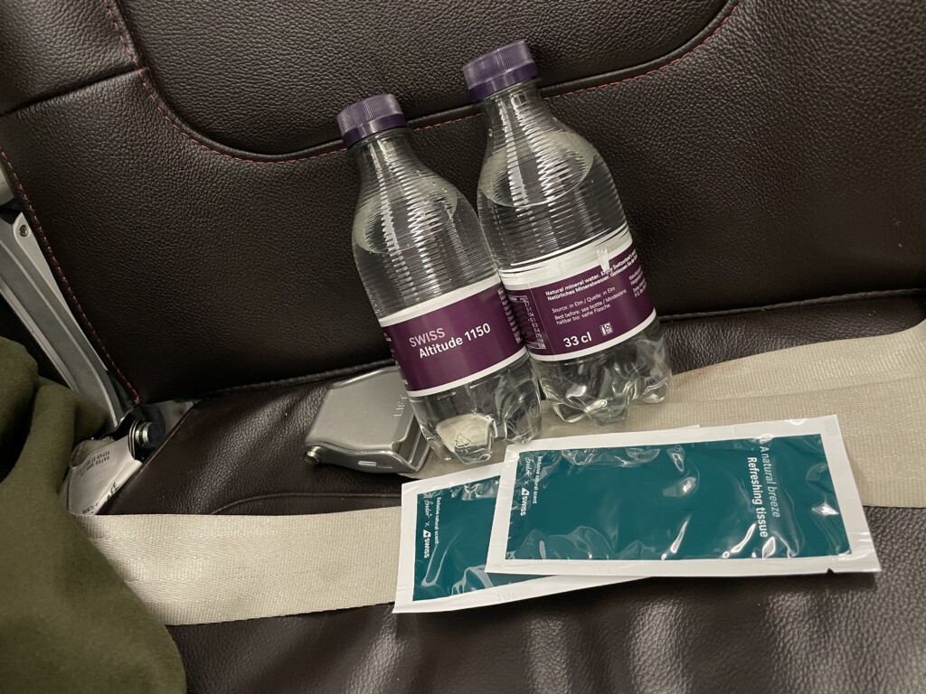 two bottles of water on a chair