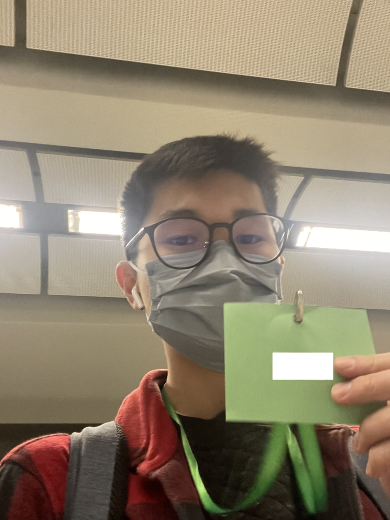 a boy wearing a mask and glasses
