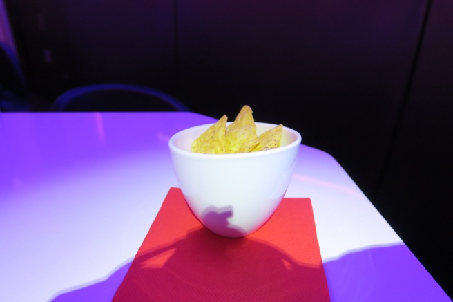 a bowl of chips on a table