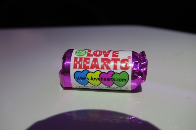 a candy wrapped in purple foil