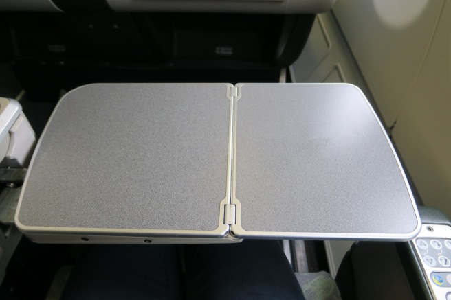 a silver rectangular object on a seat