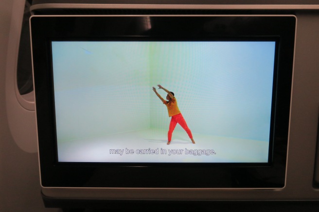 a tv screen with a person dancing