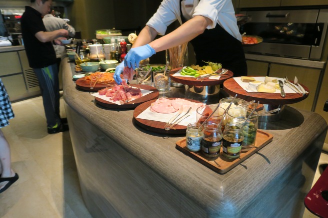 a person preparing food on a counter