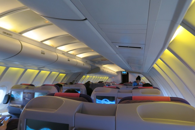 inside an airplane with many seats
