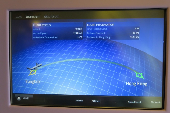 a screen with a map and an airplane on it